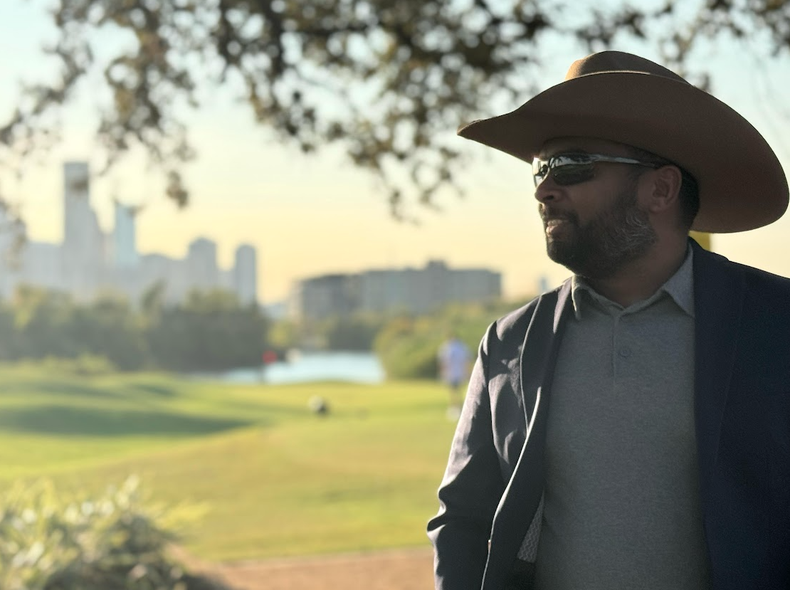 Gavin overlooking city skyline